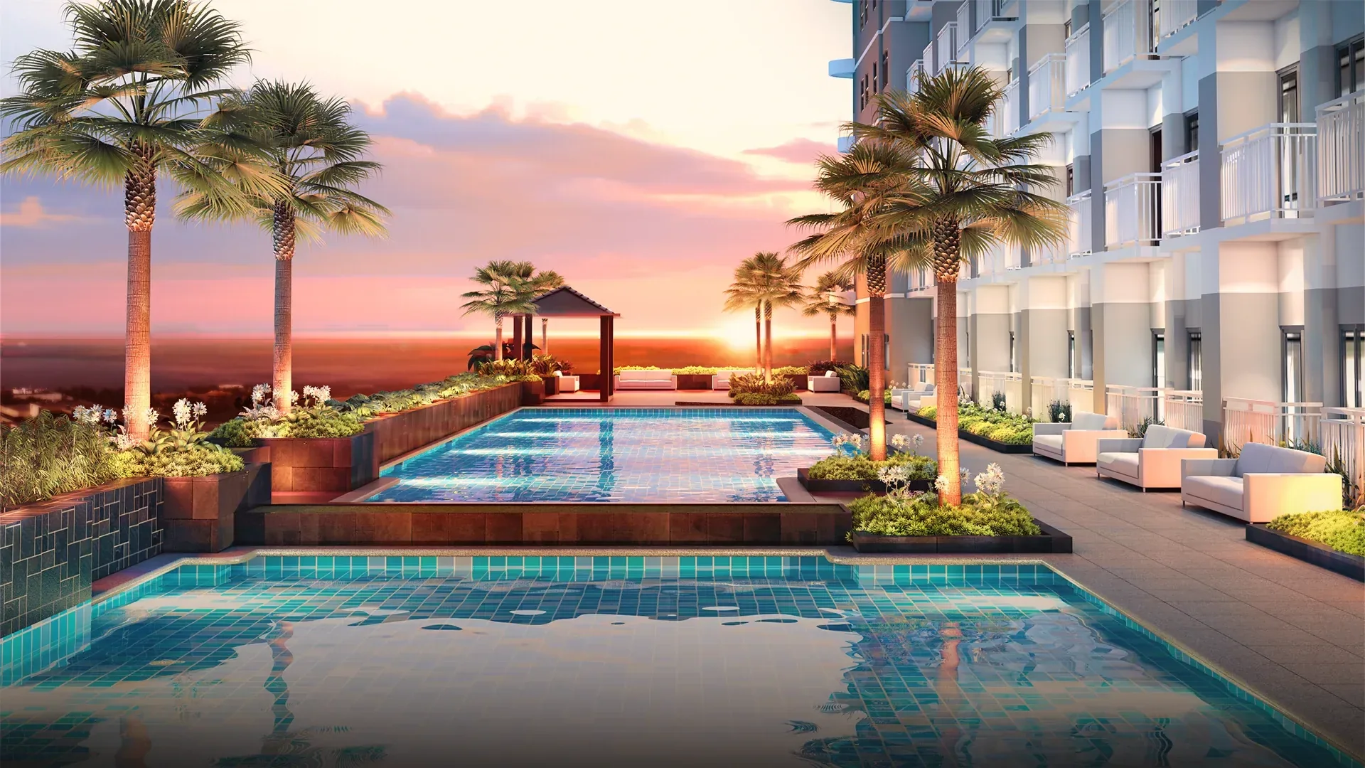 The swimming pool and cabanas on the amenity deck at Coast Residences.