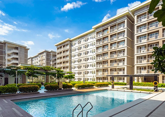 Trees Residences building facade and pool in Fairview, Quezon City.